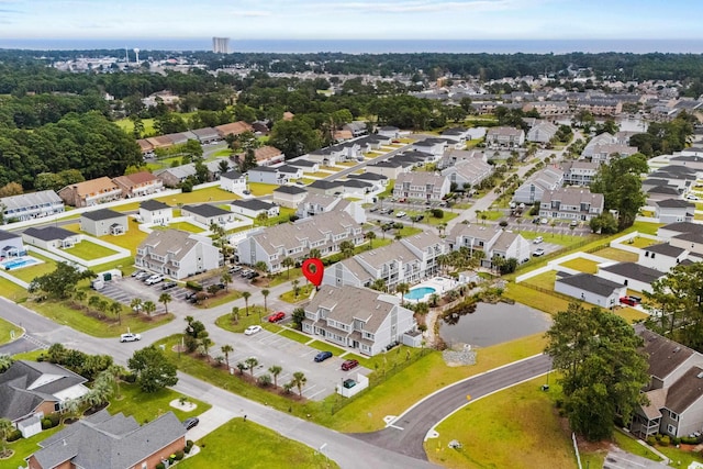1891 Colony Dr Unit 15J, Surfside Beach, SC 29575 - aerial view of property and surrounding area with nearby suburban area and a pool area