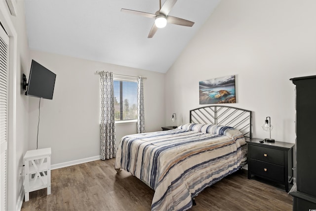 1891 Colony Dr Unit 15J, Surfside Beach, SC 29575 - bedroom featuring dark wood-style floors, high vaulted ceiling, baseboards, and ceiling fan