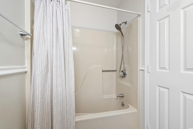 1891 Colony Dr Unit 15J, Surfside Beach, SC 29575 - bathroom with shower / bath combo with shower curtain