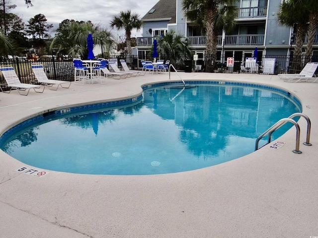 1891 Colony Dr Unit 15J, Surfside Beach, SC 29575 - community pool featuring fence and a patio area