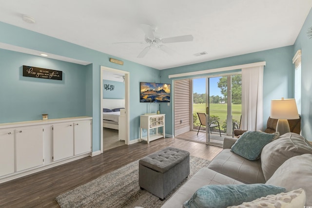 637 Waterway Village Blvd Unit 13C, Myrtle Beach, SC 29579 - living area featuring baseboards, healthy amount of natural light, dark wood-type flooring, and ceiling fan