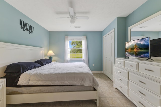 637 Waterway Village Blvd Unit 13C, Myrtle Beach, SC 29579 - bedroom with a closet, ceiling fan, and baseboards