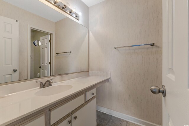 637 Waterway Village Blvd Unit 13C, Myrtle Beach, SC 29579 - bathroom with vanity, tile patterned flooring, and baseboards