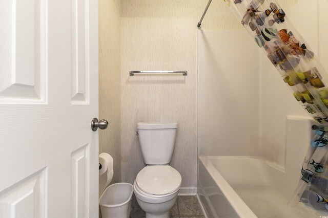 637 Waterway Village Blvd Unit 13C, Myrtle Beach, SC 29579 - full bathroom featuring toilet, baseboards, and bathtub / shower combination