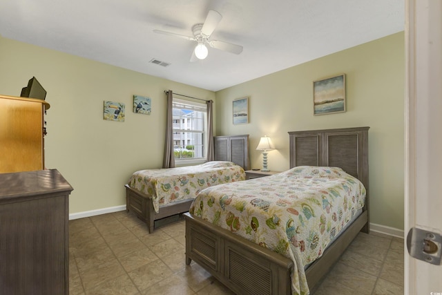 637 Waterway Village Blvd Unit 13C, Myrtle Beach, SC 29579 - bedroom with baseboards and a ceiling fan