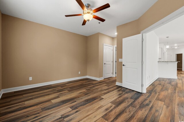 144 Puffin Dr Unit 2A, Pawleys Island, SC 29585 - spare room featuring ceiling fan, dark wood-style flooring, recessed lighting, and baseboards