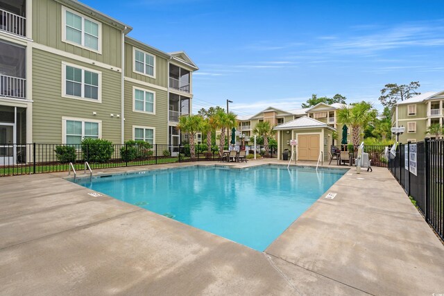 144 Puffin Dr Unit 2A, Pawleys Island, SC 29585 - community pool with a patio area