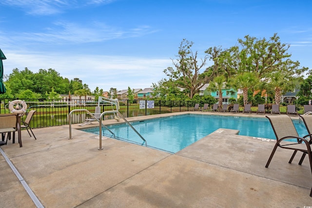 144 Puffin Dr Unit 2A, Pawleys Island, SC 29585 - community pool featuring a patio area