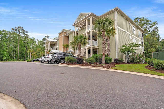 144 Puffin Dr Unit 2A, Pawleys Island, SC 29585 - view of property featuring uncovered parking
