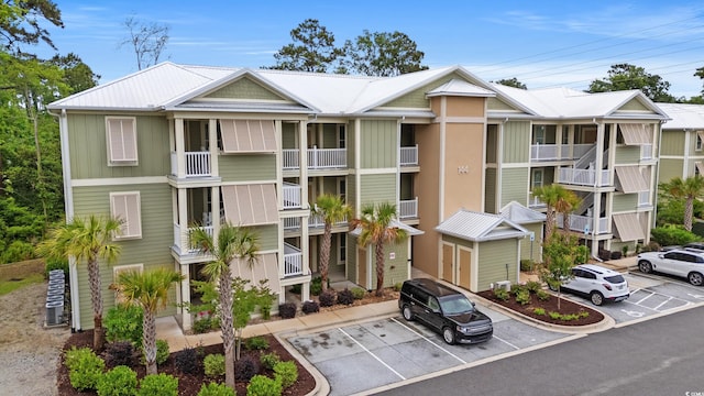 144 Puffin Dr Unit 2A, Pawleys Island, SC 29585 - view of property featuring uncovered parking