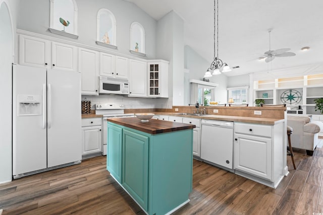 kitchen featuring white appliances, wood counters, ceiling fan, white cabinetry, and high vaulted ceiling
