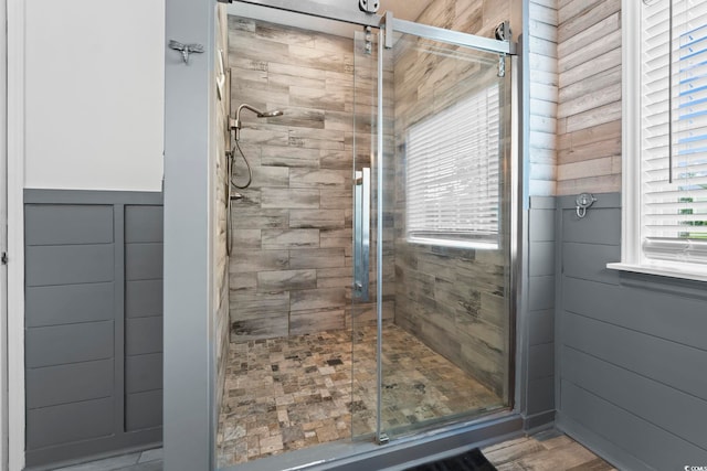 bathroom with a shower stall