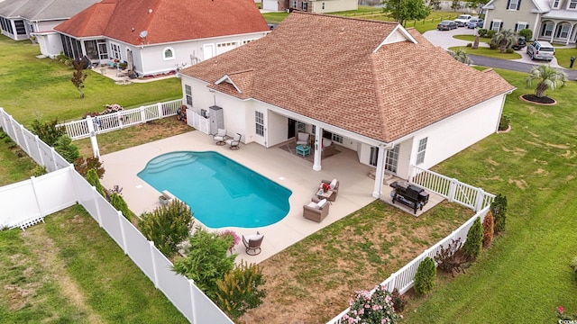 view of swimming pool featuring a patio area