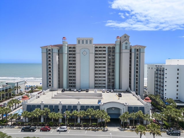 view of building exterior featuring a water view