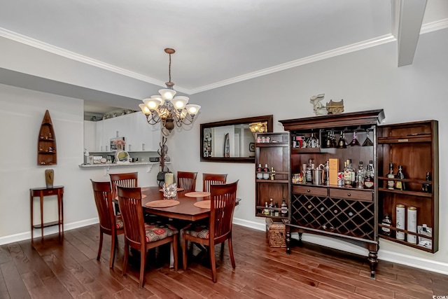 601 Hillside Dr N Unit 302, North Myrtle Beach, SC 29582 - dining space with a chandelier, wood finished floors, ornamental molding, baseboards, and a dry bar