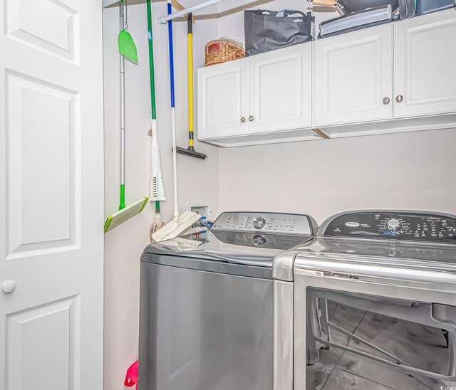 601 Hillside Dr N Unit 302, North Myrtle Beach, SC 29582 - laundry area with cabinet space and independent washer and dryer
