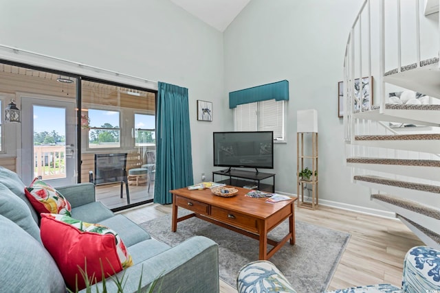 207 Double Eagle Dr Unit F-3, Myrtle Beach, SC 29575 - living area with high vaulted ceiling, stairway, and wood finished floors
