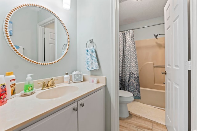 207 Double Eagle Dr Unit F-3, Myrtle Beach, SC 29575 - full bathroom with vanity, shower / bath combination with curtain, a textured ceiling, and wood finished floors