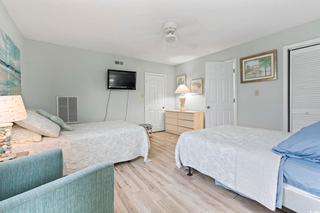 207 Double Eagle Dr Unit F-3, Myrtle Beach, SC 29575 - bedroom featuring light wood finished floors, a closet, and ceiling fan