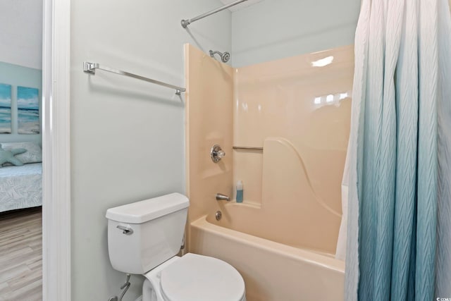 207 Double Eagle Dr Unit F-3, Myrtle Beach, SC 29575 - bathroom featuring shower / tub combo, ensuite bath, and wood finished floors