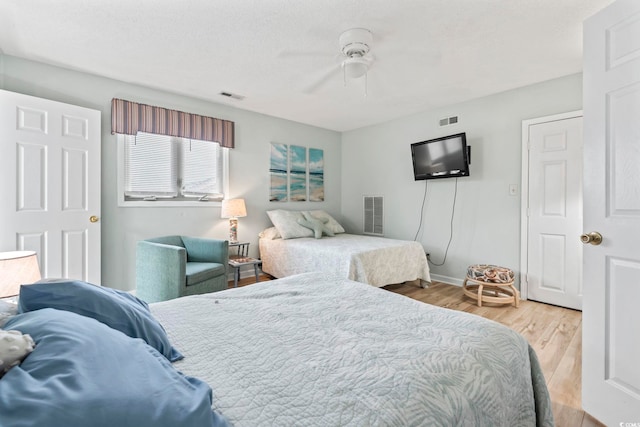 207 Double Eagle Dr Unit F-3, Myrtle Beach, SC 29575 - bedroom with wood finished floors and ceiling fan