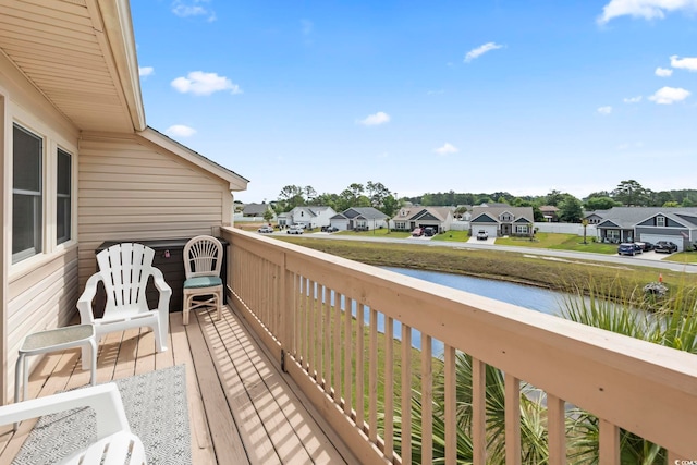 207 Double Eagle Dr Unit F-3, Myrtle Beach, SC 29575 - wooden deck with a residential view and a water view