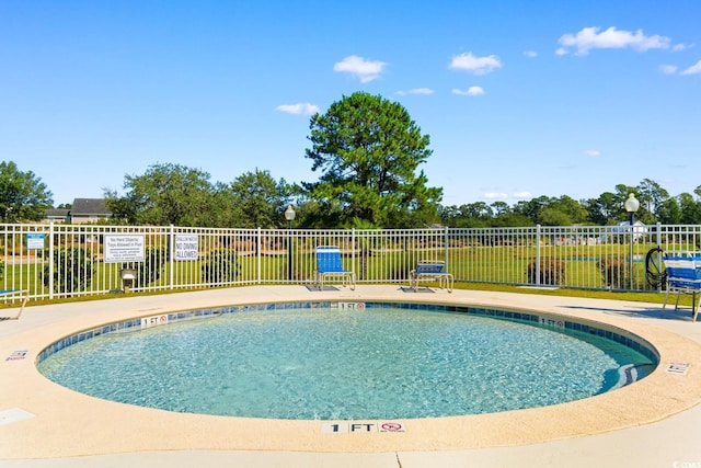 2317 Myerlee Dr, Myrtle Beach, SC 29588 - community pool with fence and a patio