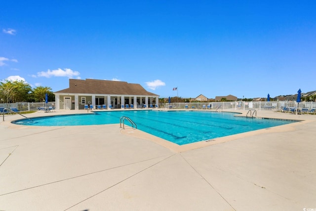 2317 Myerlee Dr, Myrtle Beach, SC 29588 - community pool with fence and a patio