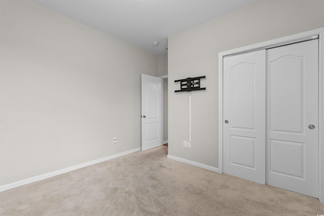2317 Myerlee Dr, Myrtle Beach, SC 29588 - unfurnished bedroom with carpet, a closet, and baseboards