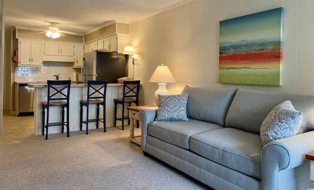 191 Maison Dr Unit B-123, Myrtle Beach, SC 29572 - living area featuring ceiling fan, ornamental molding, and light colored carpet