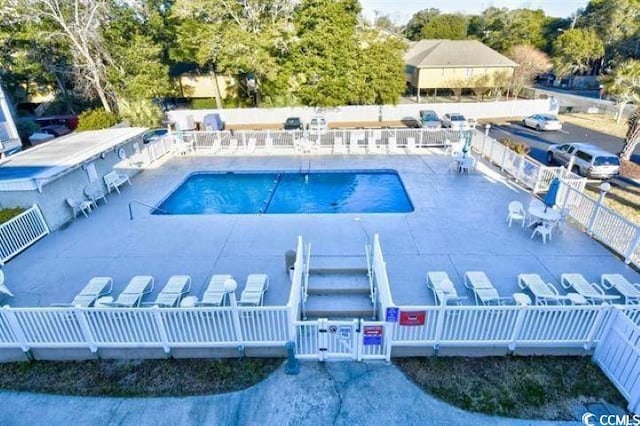 191 Maison Dr Unit B-123, Myrtle Beach, SC 29572 - community pool with a patio and view of scattered trees