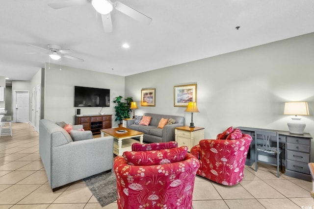 living area with light tile patterned floors, ceiling fan, and recessed lighting