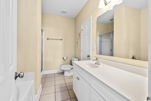 full bathroom with a stall shower, tile patterned flooring, baseboards, vanity, and toilet