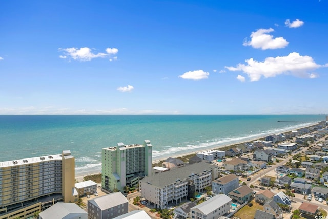 aerial view of waterfront with a beach