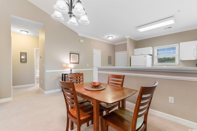 dining area with a chandelier, light colored carpet, crown molding, electric panel, and baseboards
