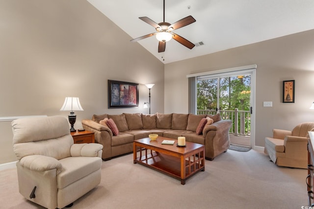 living area featuring ceiling fan, baseboards, light colored carpet, and high vaulted ceiling