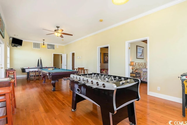 recreation room with ceiling fan, billiards, light wood-style floors, ornamental molding, and baseboards