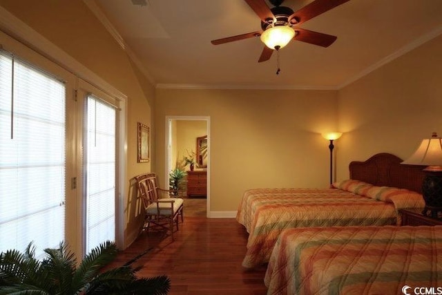 bedroom featuring wood finished floors, crown molding, baseboards, and a ceiling fan