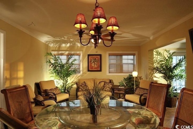 dining room featuring a chandelier and ornamental molding