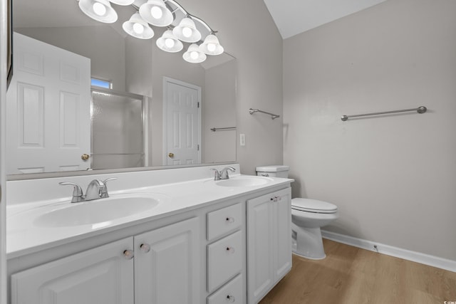 775 Kittiwake Ln, Murrells Inlet, SC 29576 - full bath with vaulted ceiling, double vanity, a stall shower, wood finished floors, and toilet