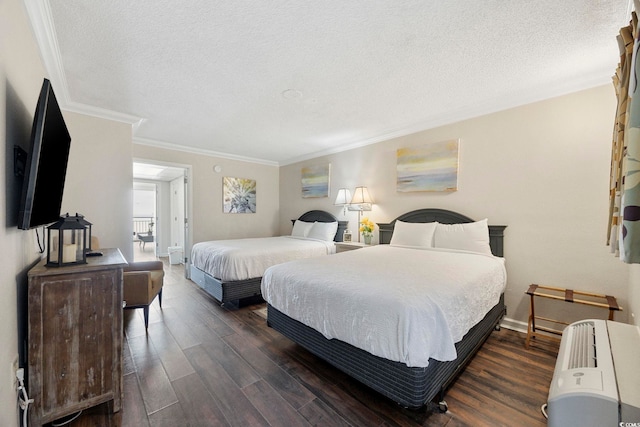 1105 S Ocean Blvd Unit 724, Myrtle Beach, SC 29577 - bedroom featuring ornamental molding, a textured ceiling, dark wood finished floors, and baseboards