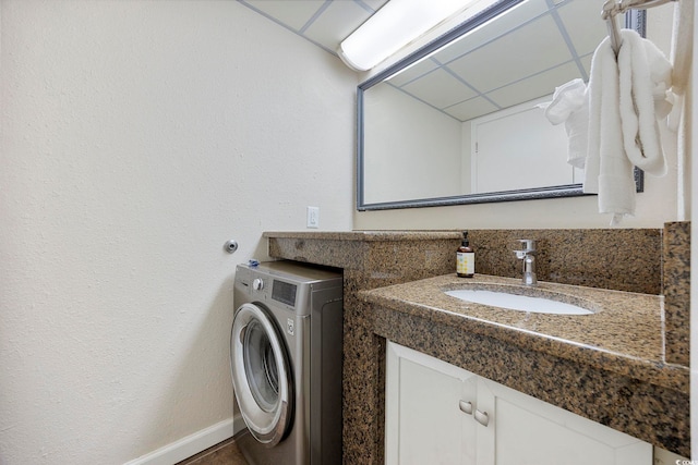 1105 S Ocean Blvd Unit 724, Myrtle Beach, SC 29577 - bathroom with washer / clothes dryer, vanity, and baseboards