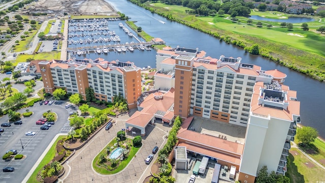 8121 Amalfi Pl Unit 7-604, Myrtle Beach, SC 29572 - bird's eye view of apartment complex, a nearby body of water, and a golf club
