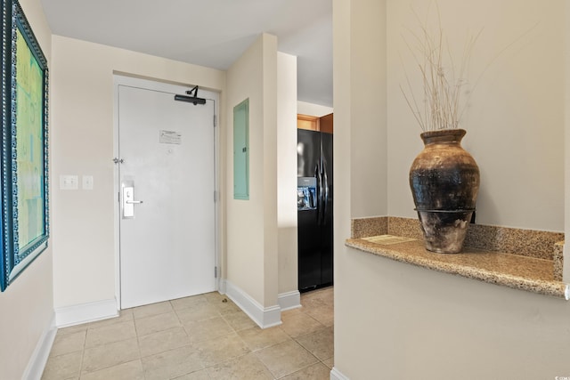 8121 Amalfi Pl Unit 7-604, Myrtle Beach, SC 29572 - entryway with baseboards and light tile patterned floors