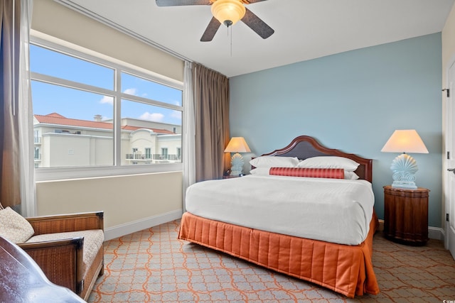 8121 Amalfi Pl Unit 7-604, Myrtle Beach, SC 29572 - bedroom featuring carpet flooring, baseboards, and ceiling fan