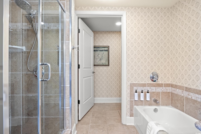 8121 Amalfi Pl Unit 7-604, Myrtle Beach, SC 29572 - bathroom featuring baseboards, a shower stall, wallpapered walls, tile patterned floors, and a garden tub