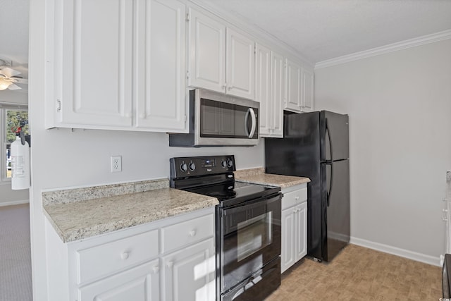 kitchen with black appliances, white cabinets, light countertops, baseboards, and ornamental molding