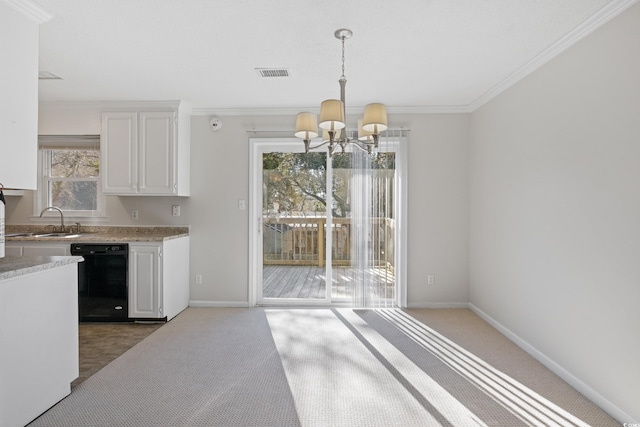 kitchen featuring black dishwasher, a chandelier, carpet flooring, a sink, and light countertops