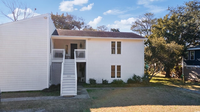 view of property featuring stairs