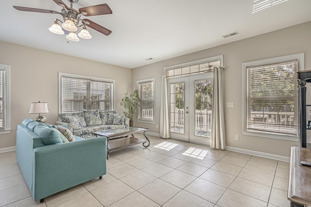 703 37th Ave S, North Myrtle Beach, SC 29582 - living room featuring ceiling fan, french doors, and baseboards